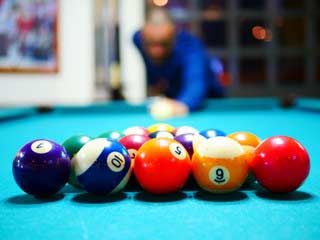 Pool table refelting during installation in Minneapolis